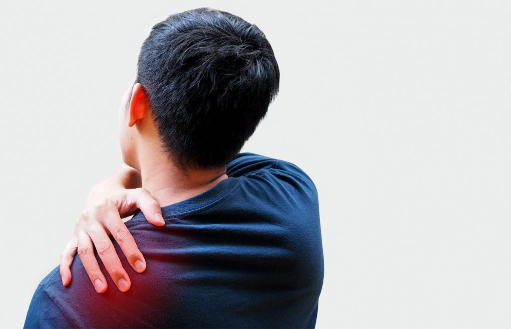 man in pain on his shoulder