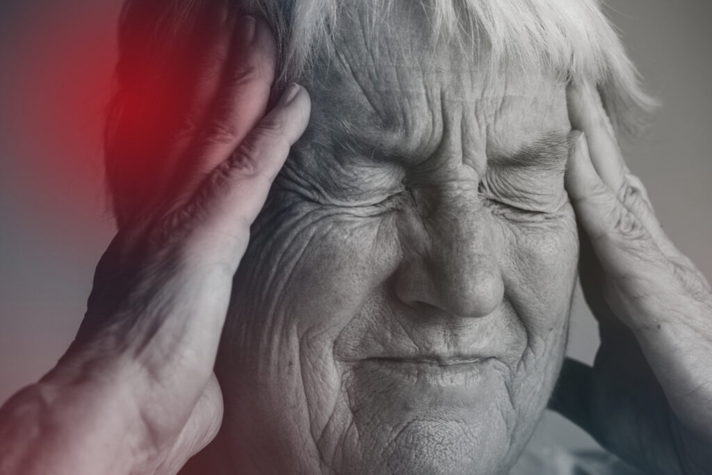 old man suffering migraine